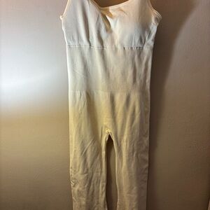 Cream Bodysuit One Piece with Elegant Design